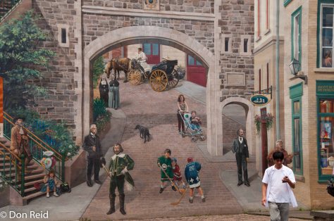 Wall art blends with reality (clue : the guy with the cellphone) in the Old Town, Quebec City
