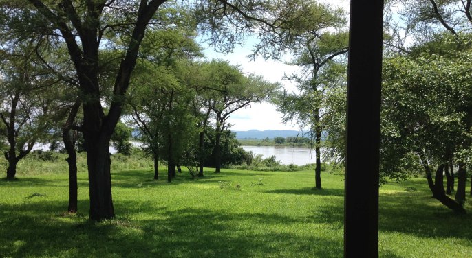 The gardens at Rademan's Farm, Zambezi River in the distance