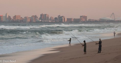 Fishermen on La Lucia beach, Durban in the background
